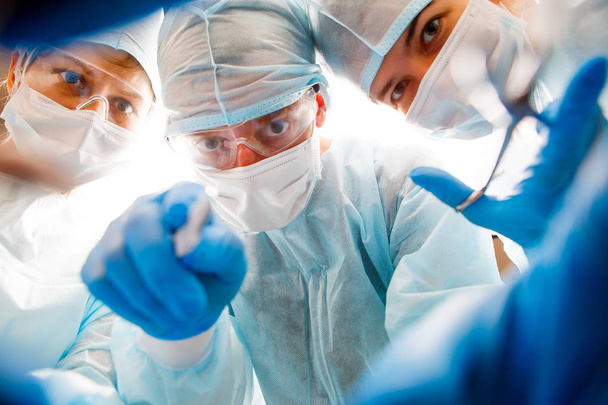 Surgery team in operating room - Photo, Image