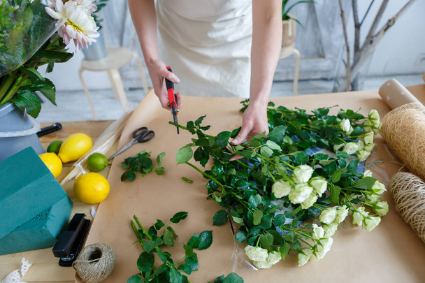 Photo of florist with flowers - Foto, Imagem