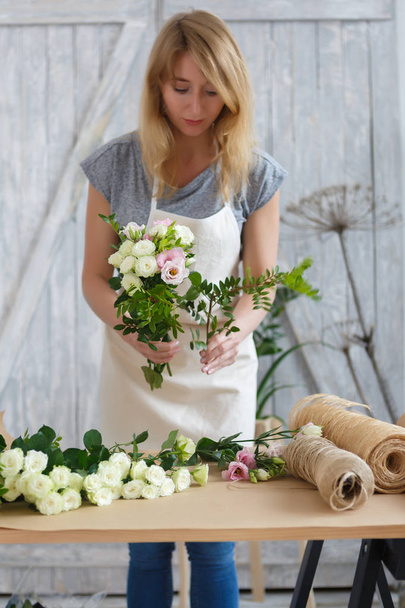 Photo of florist making bouquet - Φωτογραφία, εικόνα