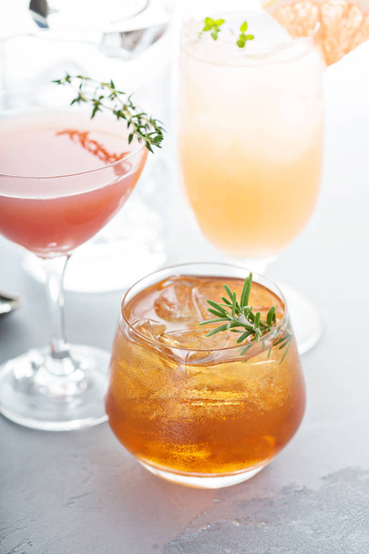 Variety of citrus cocktails on gray surface - Foto, immagini