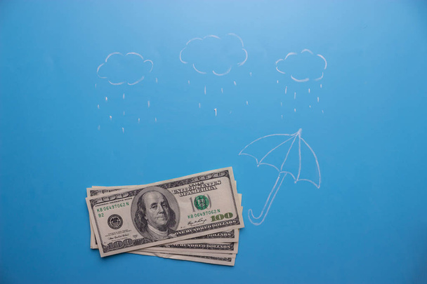 money under the umbrella - Φωτογραφία, εικόνα
