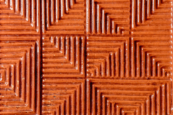 Een opmerkelijke rode duplicaat tegel textuur op keramische basis - Foto, afbeelding