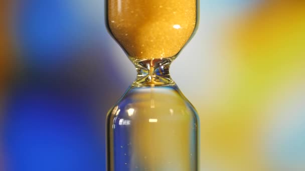 Hourglass. Super Close-up View of Sand Flowing Through an Hourglass. - Materiał filmowy, wideo