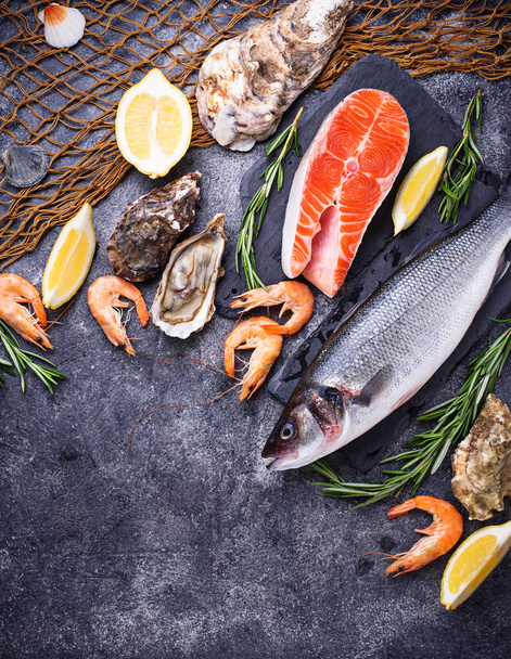 Salmon, seabass, shrimps and oysters - Photo, Image