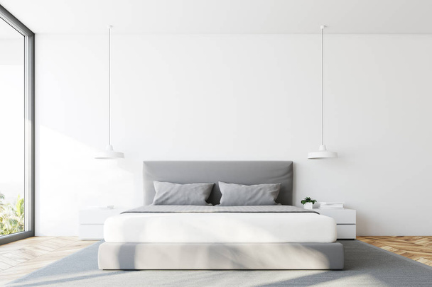 White bedroom bed front view - Fotografie, Obrázek
