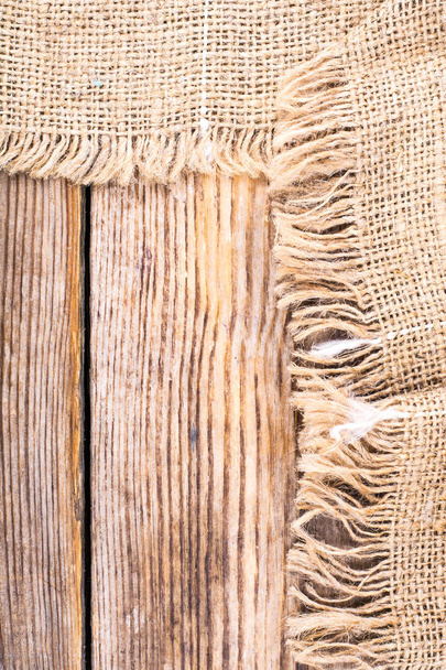 Sackcloth texture on wooden table - Fotoğraf, Görsel