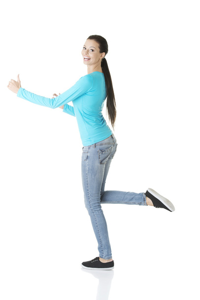 Happy student girl running - Zdjęcie, obraz