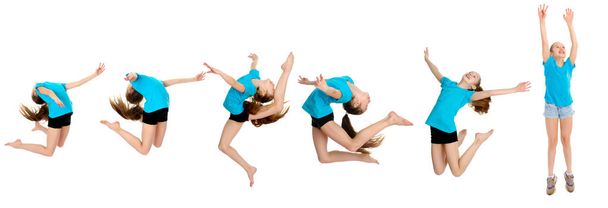 Дівчина гімнастка виконує стрибок
. - Фото, зображення