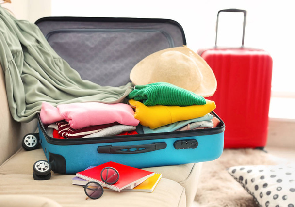 Packed travel suitcases indoors - Foto, Imagen