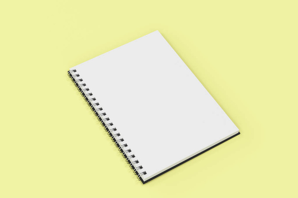 Opend notebook spiral bound on yellow background - Foto, immagini