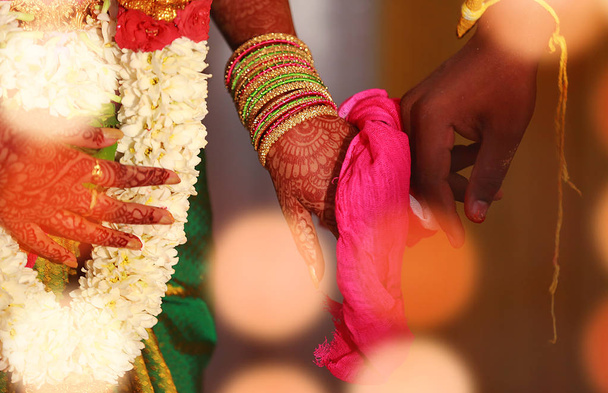 Close up of Indian couple's hands at a wedding - Photo, Image
