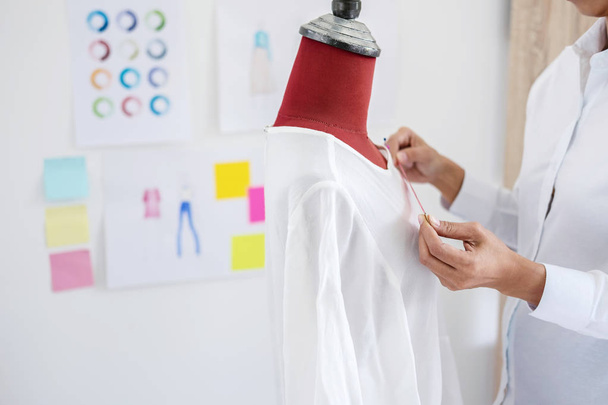 Young woman dressmaker or designer working as fashion designers  - Fotografie, Obrázek