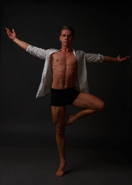 man dances, sport, concept, ballet - Foto, afbeelding