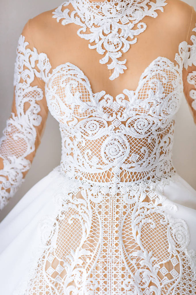 Close-up of a beautiful bridal dress with a lace - Photo, Image