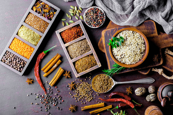 Spices for cooking with kitchen accessories on an old background - Foto, Imagem