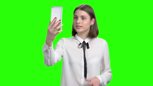 Teenage girl having online video chat using smartphone. - Footage, Video