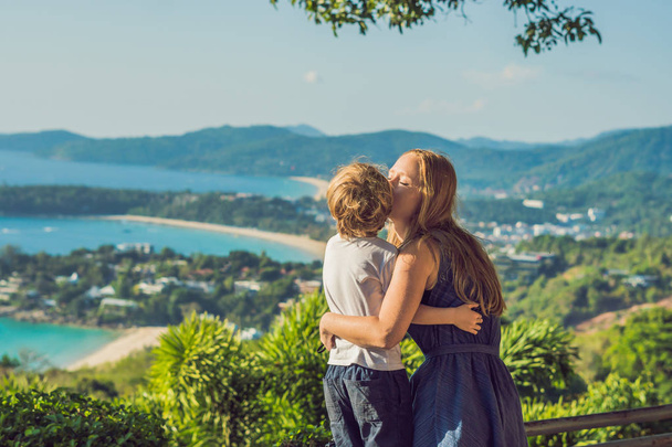 Mom and son on Karon View Point in sunny day. Phuket. Traveling with children concept. - 写真・画像