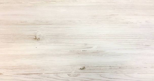 Blanco claro lavar la superficie de textura de madera suave como fondo. Grunge blanqueado tablones de madera tabla patrón vista superior
. - Foto, Imagen