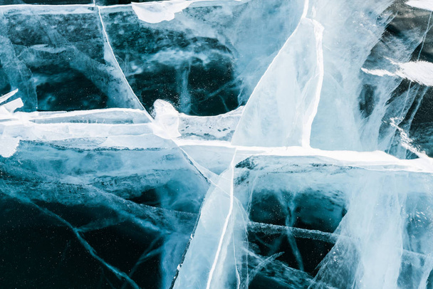 Ice crack ground texture and background, Baikal winter season Russia - Фото, изображение