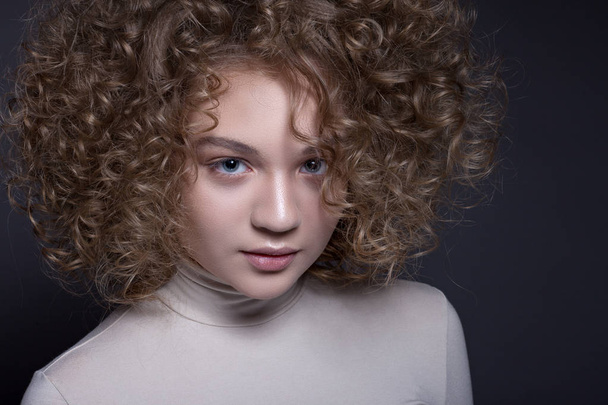 Portrait of a beautiful teenage girl with a creative make-up and - Zdjęcie, obraz