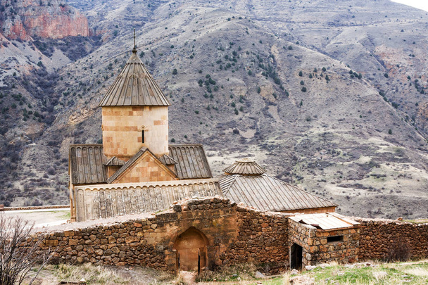 Scenic Novarank monastery in Armenia. Noravank monastery was founded in 1205. It is located 122 km from Yerevan in a narrow gorge made by the Darichay river nearby the city of Yeghegnadzor - Fotó, kép