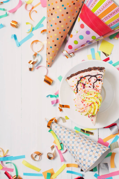 birthday cake and  decoration on white wooden background - Фото, изображение