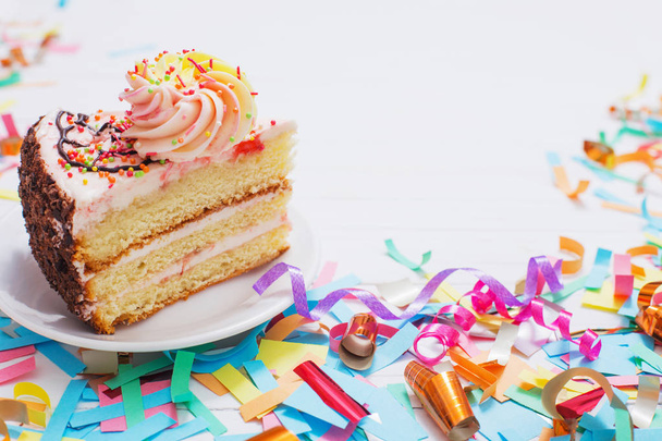 birthday cake and  decoration on white wooden background - Fotografie, Obrázek