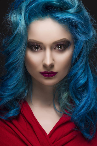 Close-up portrait of beautiful dyed blue colour hair girl wearin - Fotó, kép