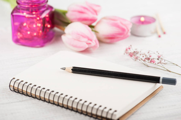 Notebook, flowers and pink lights - Fotoğraf, Görsel