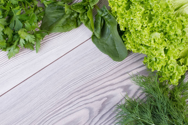 Frame from fresh green herbs and vegetables. - Photo, Image