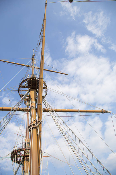 Twin masts and wooden spars of an old galleon - Photo, Image