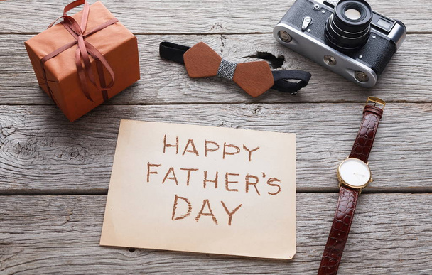 Happy Fathers Day card on rustic wood background - Foto, afbeelding