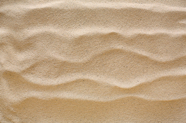 Plage de sable fond. Surface de texture naturelle de bord de mer
 - Photo, image