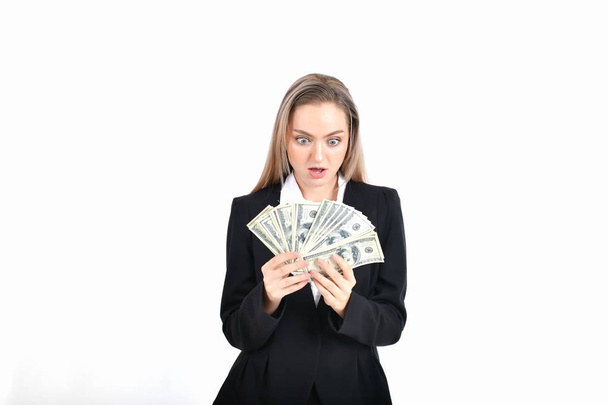 business concept. Beautiful businesswoman is counting her money. - Photo, Image