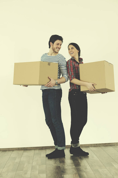 happy Young couple moving in new home - Фото, изображение