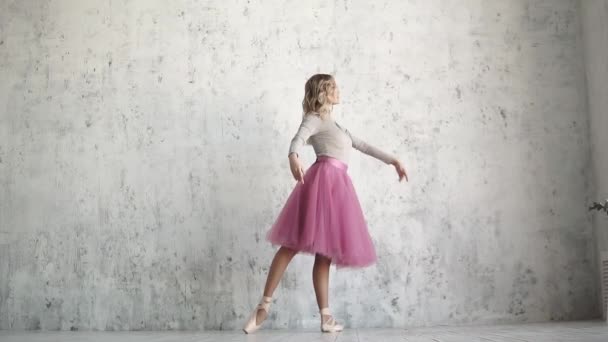 graceful ballerina beautifully dances in a classic tutu and pointe. slow motion - Footage, Video