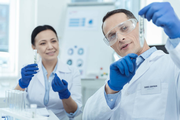 Experienced researchers working in a lab - Photo, image