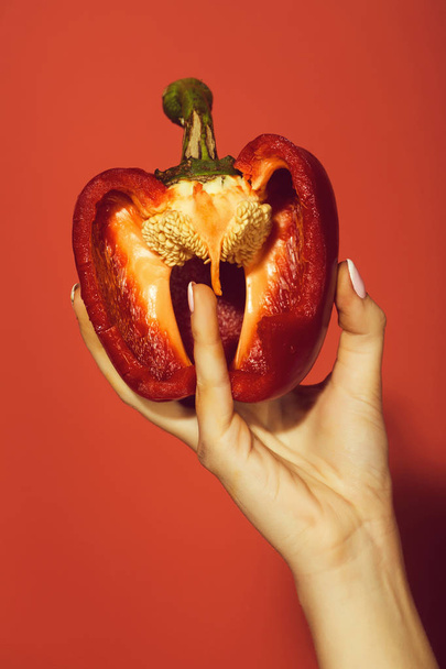 heart concept, hand of woman hold sweet bell pepper - Zdjęcie, obraz