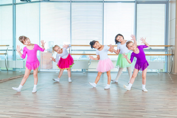 Children dancing in choreography class. happy children dancing on in hall, healthy life, kids togethern dance kid class - Photo, image