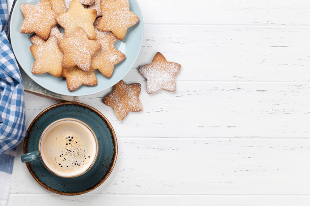 Cookies and coffee on white wooden table. Top view with space for your text - Fotografie, Obrázek