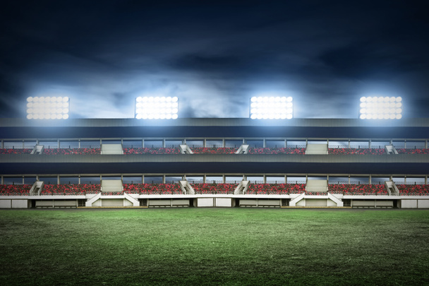 Футбольне поле стадіону вночі
 - Фото, зображення