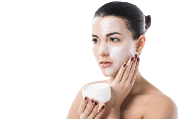beautiful girl applying cream on face isolated on white - Photo, Image