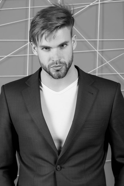 Businessman with bearded face, hair, haircut. Man in formal suit jacket, tshirt, fashion. Mens fashion style and dress code. Business, entrepreneurship and career concept, black and white - Fotó, kép