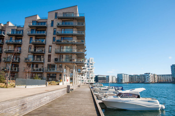 Waterfront of Copenhagen with modern architecture and boats - Fotó, kép