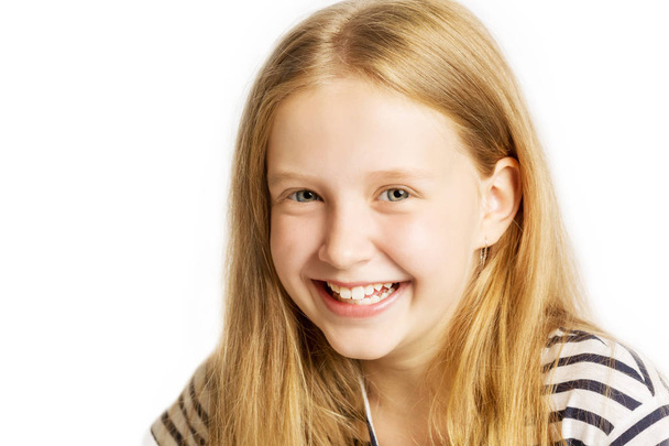 Cute teen girl with long hair laughing, close-up - Zdjęcie, obraz