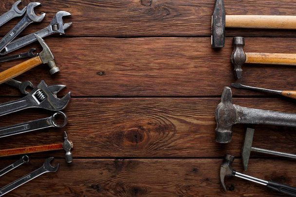 Border of repair tools on wood background with copy space - Photo, Image