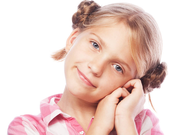 Portrait of a happy little girl over white background - Photo, image