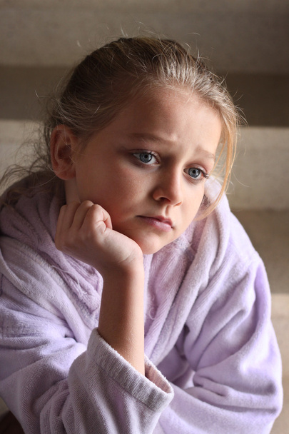 Little sad looking girl - Foto, immagini