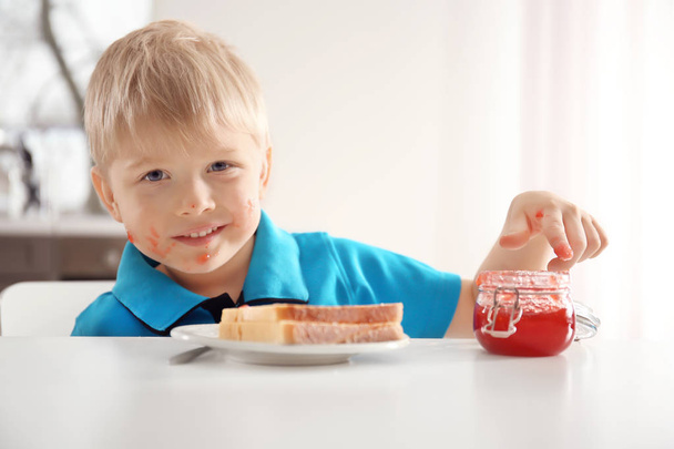 little boy with jar of jam  - Zdjęcie, obraz