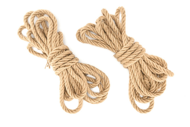 top view of arranged tied nautical ropes isolated on white - Fotó, kép